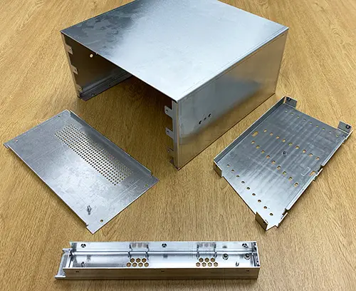 Punched and formed enclosure panels and covers.